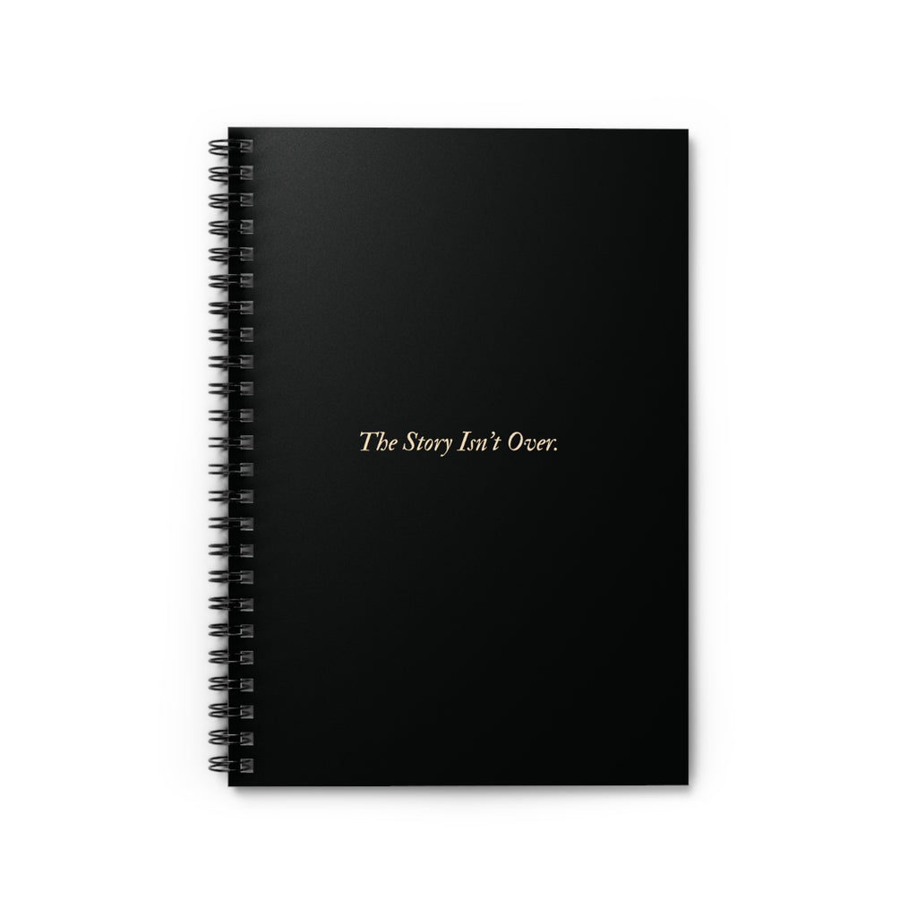 Spiral Notebook — Black Gold Quote "The Story Isn't Over."