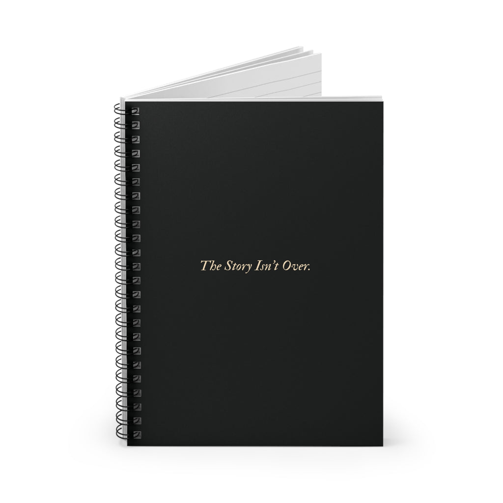 Spiral Notebook — Black Gold Quote "The Story Isn't Over."