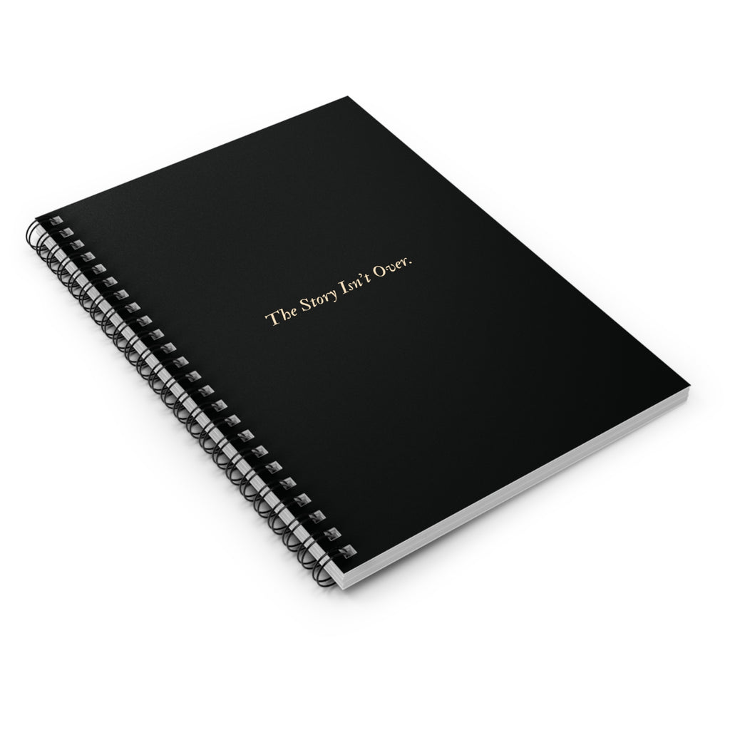 Spiral Notebook — Black Gold Quote "The Story Isn't Over."
